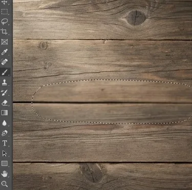 Photoshop Content-Aware Fill applied to watermark test image shows limitations versus a free remove text from image tool, leaving blurry patches and distorted texture on complex wood grain that needs seamless inpainting.